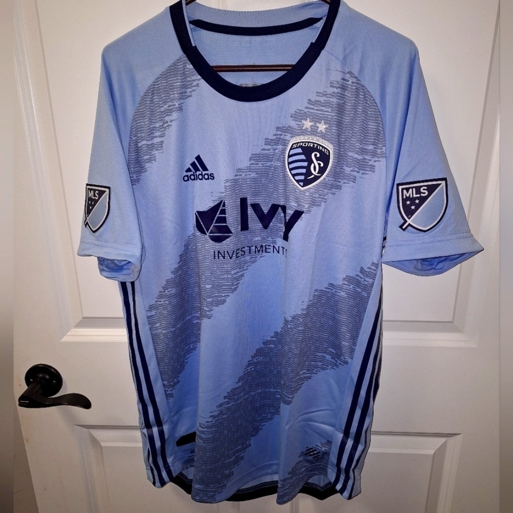 An Adidas official MLS Kansas City Sporting jersey in a men's size large. NWT